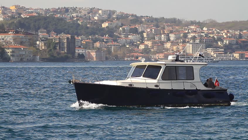 Luxury yacht sails in Bosporus waters
