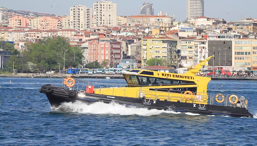 ISTANBUL - APRIL 28: Coast guard boat KIYI EMNIYETI maneuvering in front of