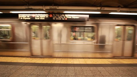 NEW YORK, NEW YORK/USA - May15, 2017: New York City subway train arriving metro Station Manhattan 