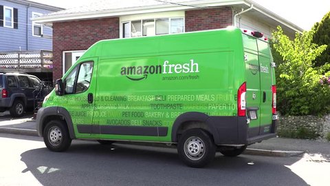 Amazon Fresh truck van, groceries delivery man - Revere, Massachusetts USA - May 27, 2017