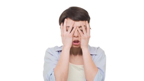Very dissapointed Caucasian brunette female making double facepalm over white background