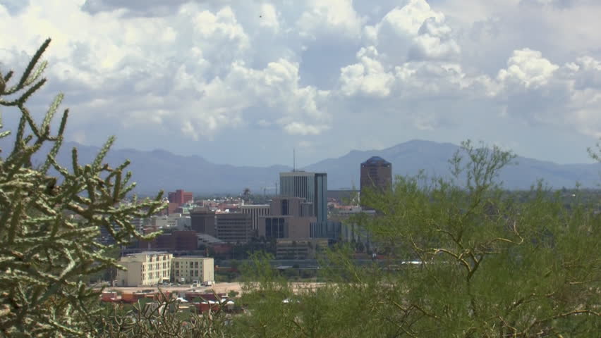 Tucson, Arizona travel scenic overview, zoom in, to frame city skyline. 1080p.