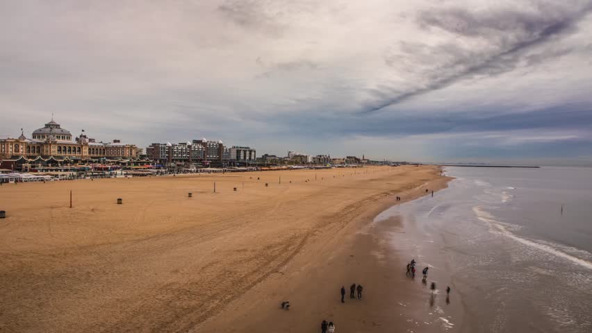 Scheveningen pier in The Hague general view of the coastline at twilight time. 4K Time Lapse Footage.