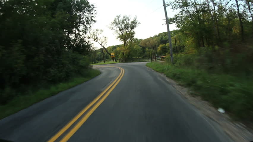 Driving in the countryside of Western Pennsylvania on a summer evening.