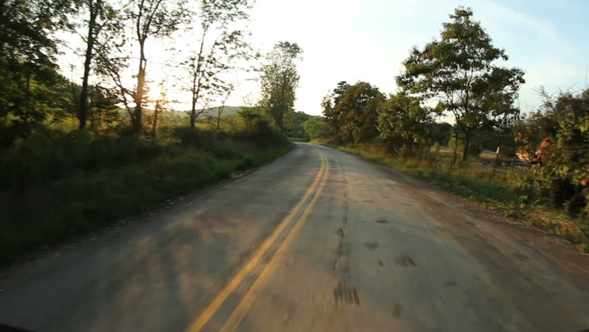 Driving in the countryside of Western Pennsylvania on a summer evening.