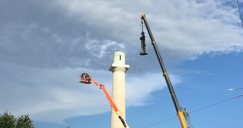 NEW ORLEANS, LOUISIANA CIRCA CIRCA MAY 19, 2017 - Construction crew removing confederate monument General Robert E. Lee statue with crane from Lee Circle 4K