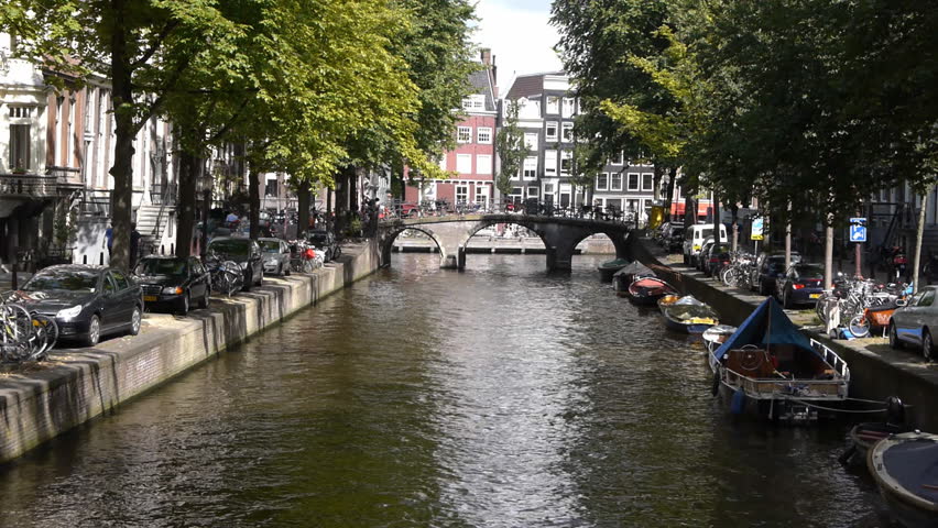 Amsterdam canal with bridge, in the historical centre