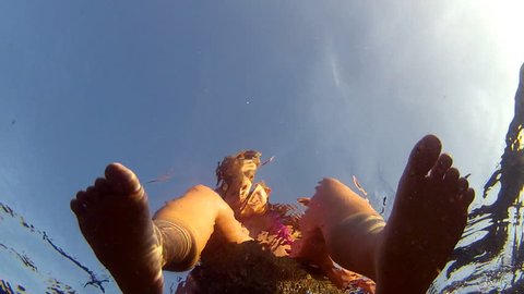 Girl`s feet in the ocean. Stock Video