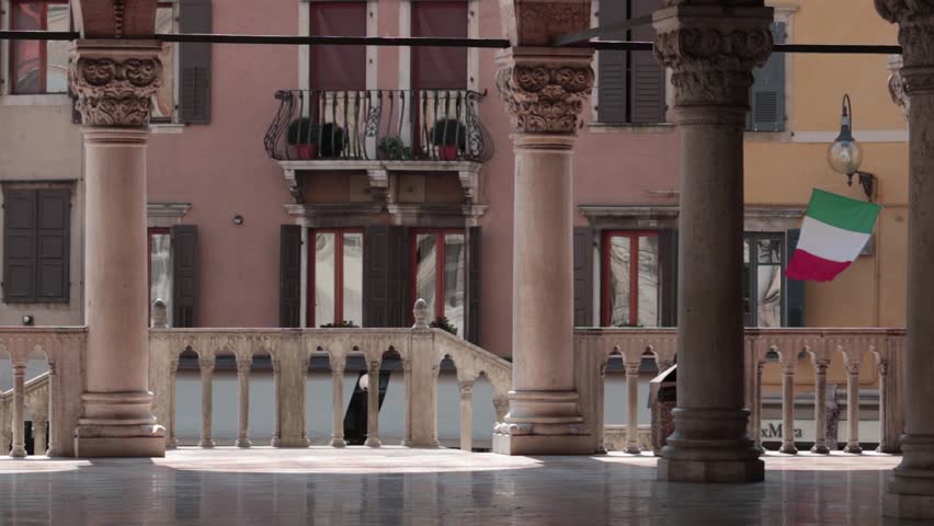 loggia del lionello, footage of landmark in a famous town in friuli-venezia giulia with italian flag