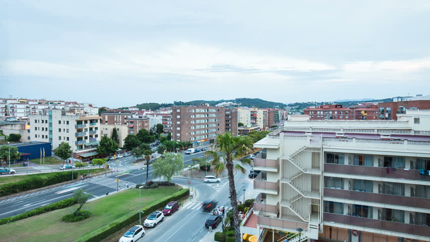 View from the balcony of the hotel to the street of Lloret de Mar in the evening
