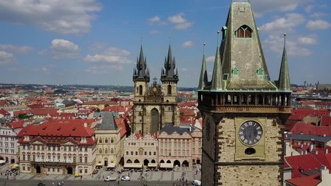 Beautiful aerial view of the Prague clock tower in the city town square. View from above. 