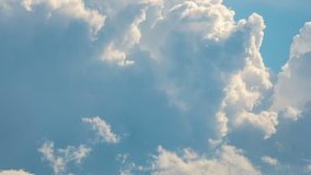 Blue sky white clouds, Fluffy white clouds move, Cumulus cloud timelapse film, Summer blue sky time lapse footage, Majestic amazing blue sky video, Fast white clouds form. Cloud time lapse background.