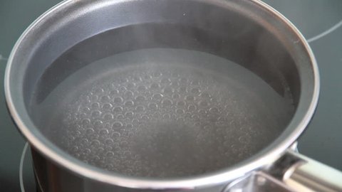 Boiling water in kitchen