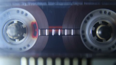 Vintage audio cassette tape playing, macro
