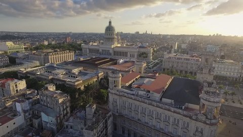 Drone flying over Old Havana, Cuba: Capitolio monument and Habana Vieja district. Aerial view of La Habana, Cuban capital city. Urban landscape from the sky with buildings, homes, houses, landmarks