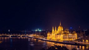Budapest video card of city. Night view golden stars light dark blue sky. Parlament building Danube river evening. Magic show Budapest word Hungary. Beautiful view Budapest cityscape night Parliament