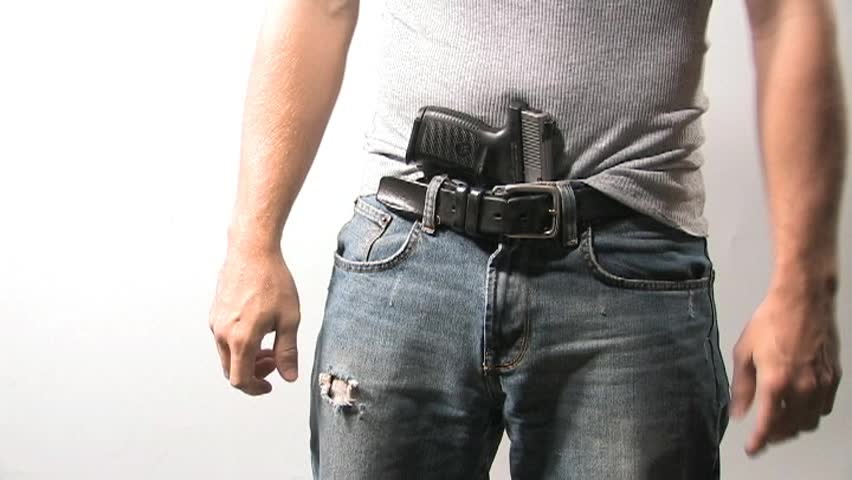 Man Pulls Out Gun And Cocks It