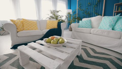 Hand-made table and two sofas with pillows