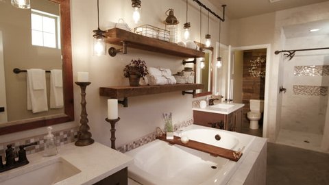 Master Bathroom Lower From Sink. lowering shot in a modern master bathroom with a rustic industrial style
