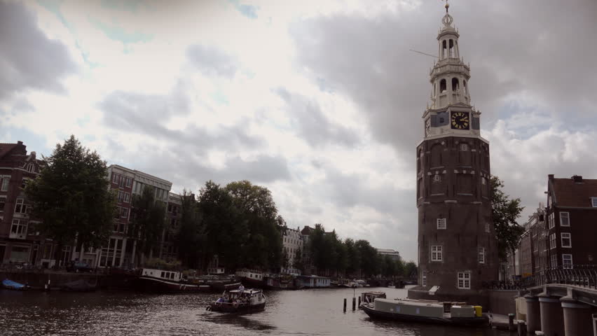 Amsterdam canalboats and Montelbaans Tower timelapse