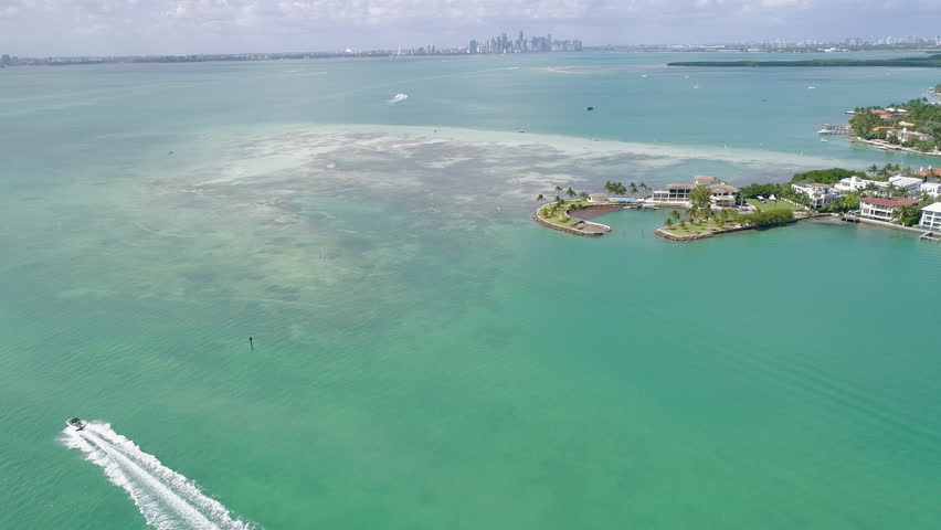 Key Biscayne Florida Southwest Point Sandbar Aerial Following Recreational Motor Boat
