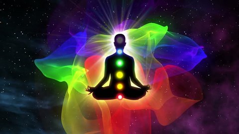 Seven Chakras Appearing over a Person Gaining Enlightenment Silhouette of Person Sitting in Lotus Pose of Yoga Surrounded with Aura | Spiritual Awakening and Unlocking 7 Chakra with Deep Meditation 