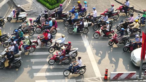 Ho Chi Minh City, Vietnam - April 2017 - Busy roads of Saigon, chaos on the street and above.