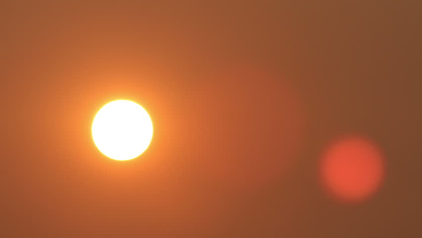 Timelapse of yellow sun moving across the sky. HD 1080p time lapse.