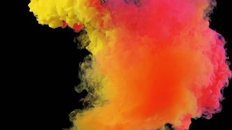 Colorful rainbow paint drops from above mixing in water. Ink swirling underwater. Cloud of ink isolated on black background with alpha. Colored abstract smoke explosion animation effect. Close up view