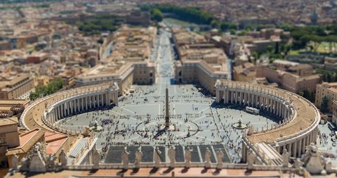 Time lapse View at St. Peter's square just before the Pope Francis speech from dome of St. Peter Basilica in Rome, Italy. Tilt shift perspective.