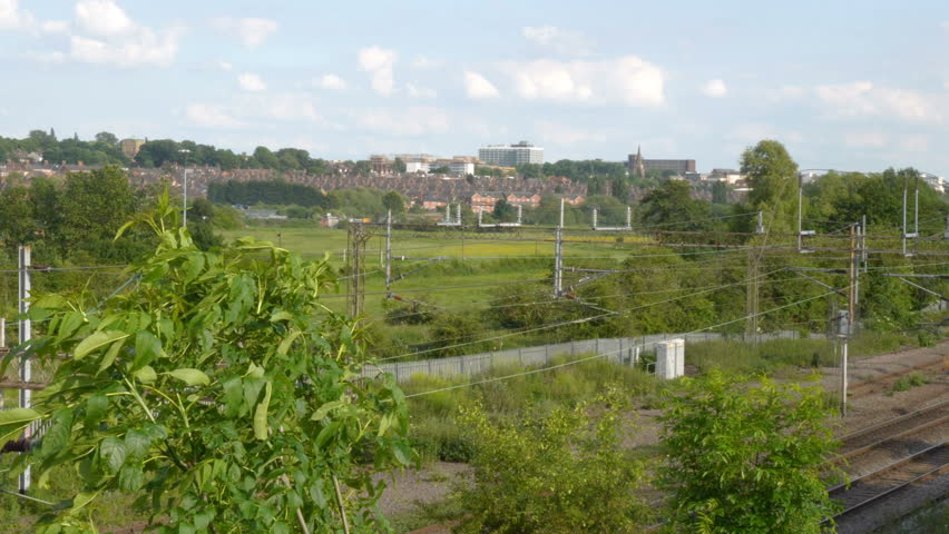 Overhead Metal high voltage electric supply cables over UK railway