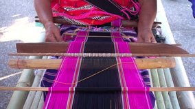 Woman Karen Tribal Weaving of traditional in the countryside Thailand. 4K video