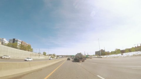 Denver, Colorado, USA-April 30, 2017.  POV point of view -Driving North on interstate highway I25 after snow storm in the Spring.