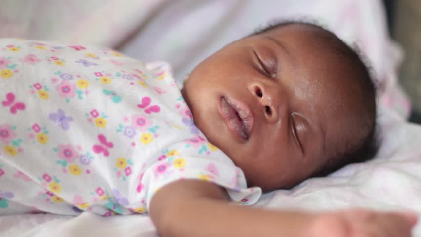 2 Week Old Black Baby Sleeping Peacefully CloseUp Sideview Royalty-Free Stock Footage #27551281