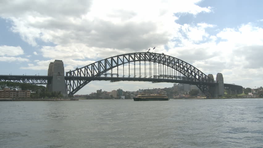 Sydney Harbor Bridge at daytime with ships in the Harbor Bay Area