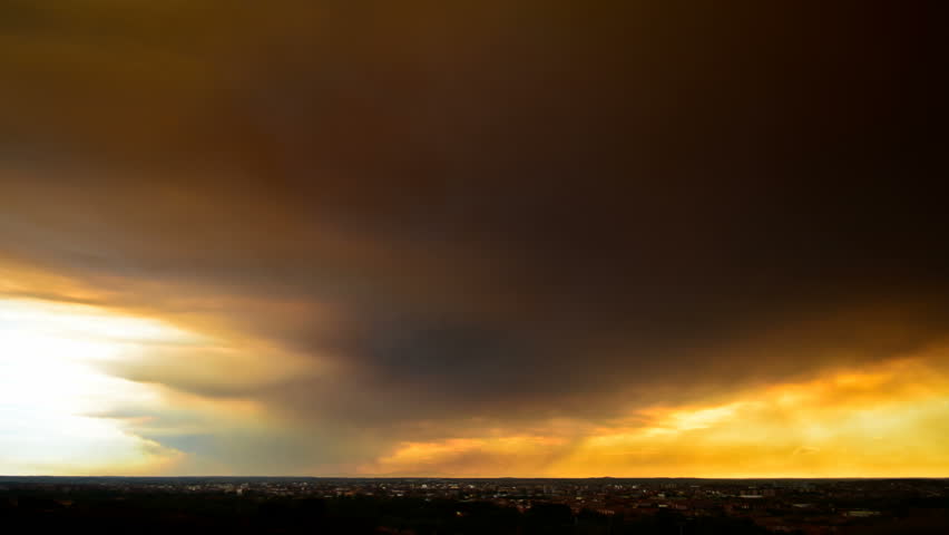 Dramatic sunset time lapse. Forest fire smoke.