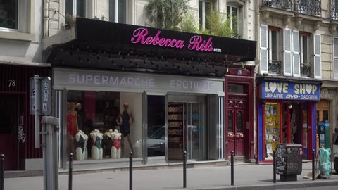 PARIS, FRANCE - MAY 22, 2017: Luminous in the neon sign of a Nightclubs and Sex Shops in the city Paris