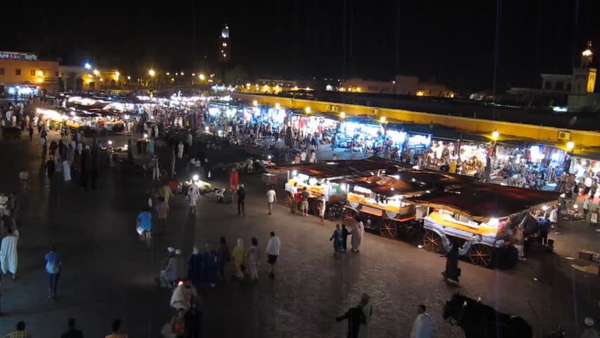 MARRAKECH, MOROCCO - CIRCA 2012: Jemaa el-Fnaa square. The imam, the community