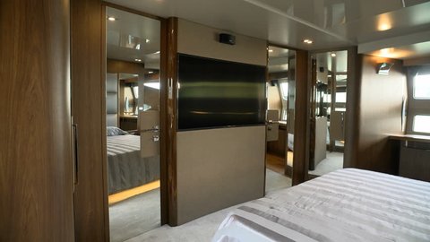 Spacious elegant master cabin on a luxury yacht
