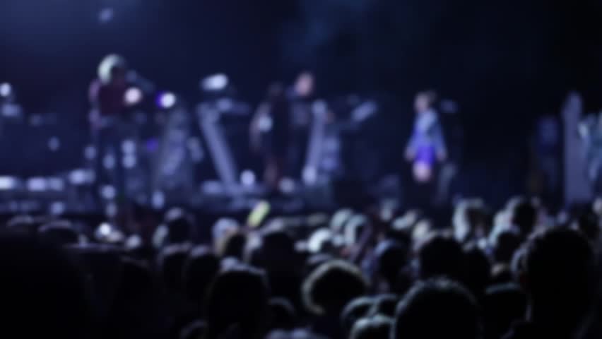 anonymous crowd at a pop concert