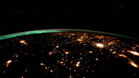 Planet Earth at night seen from the space. Elements of this video furnished by NASA. Video de stock