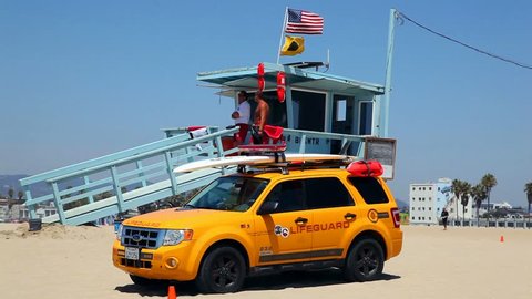 VENICE BEACH, CALIFORNIA, USA - AUGUST 18, 2012: California Life Guard personnel closely watch the beach for possible emergency situations on August 18, 2012 in Venice Beach, California