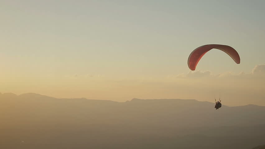 Paragliding into the sunset in Brazil Royalty-Free Stock Footage #27609106