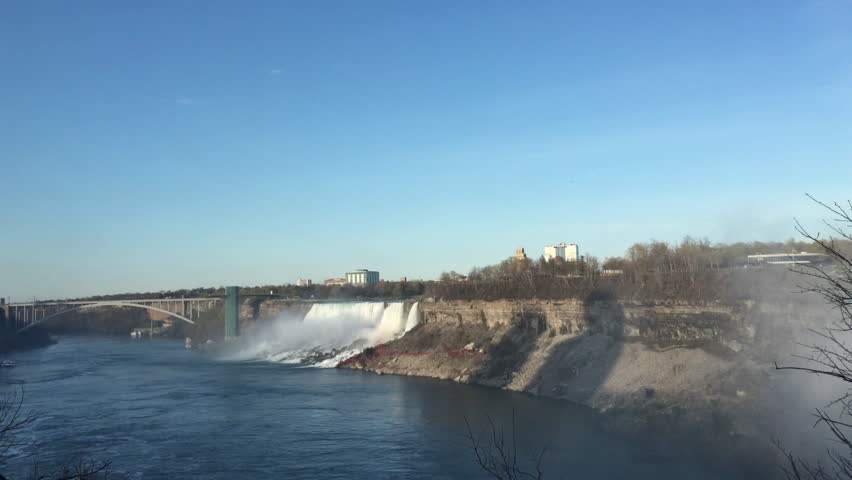 Boat sailing in front of American Falls 