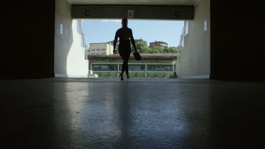 Woman going out on the stadium