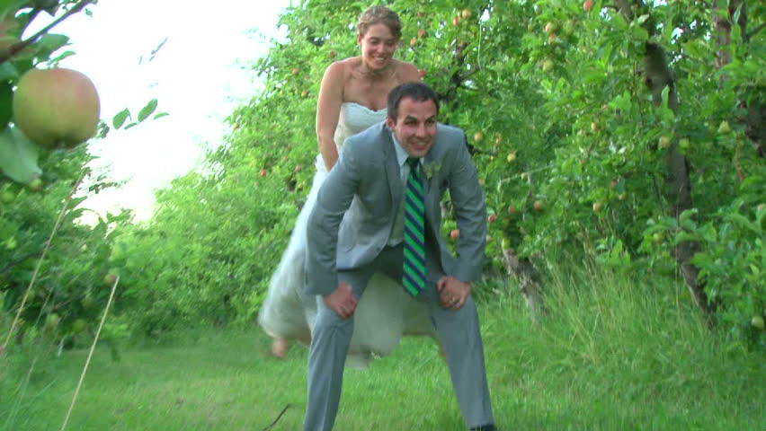 Model released bride and Groom posing together and having fun for the camera.