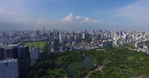 Aerial: Bangkok with a bird's eye view. Park, golf course and business center.