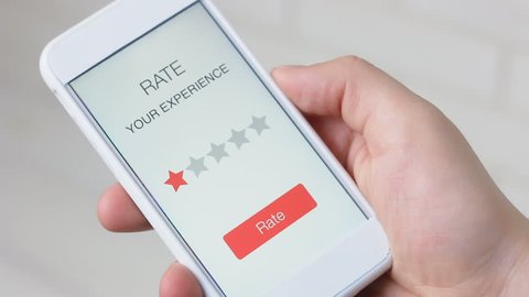 Man gives one star rating using smartphone application