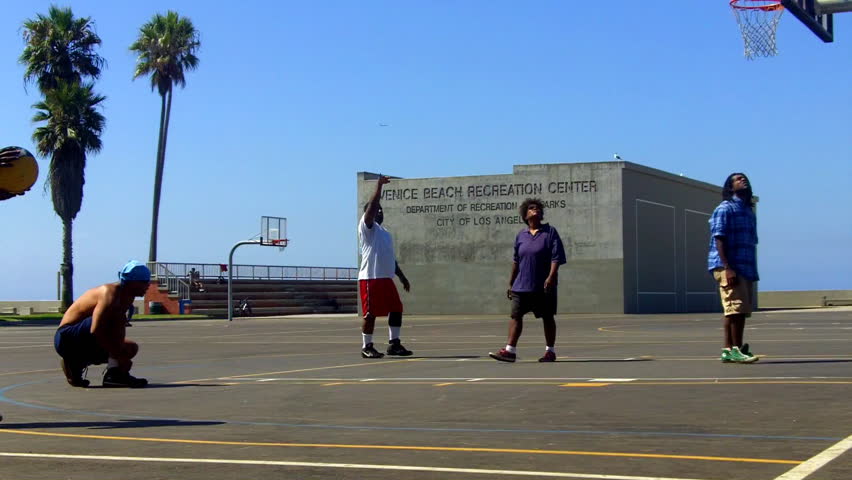 VENICE BEACH, CA - August 2, 2012:  Basketball players on the courts at the