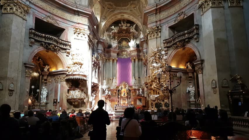 Vienna, Austria - March 30, 2017:Austriaan catholic cathedral, located in Vienna, in all its gothic grandeur and beauty with splendid chandelier, golden altar, various Christian sculputures